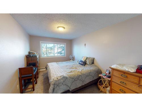 1214 - 2015 2Nd Street N, Cranbrook, BC - Indoor Photo Showing Bedroom