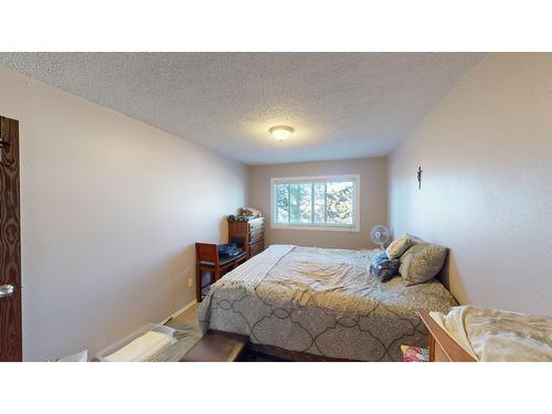 1214 - 2015 2Nd Street N, Cranbrook, BC - Indoor Photo Showing Bedroom