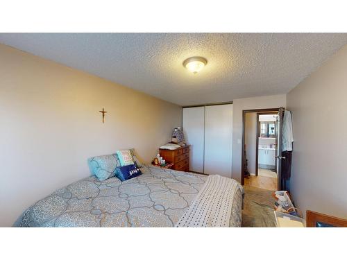 1214 - 2015 2Nd Street N, Cranbrook, BC - Indoor Photo Showing Bedroom