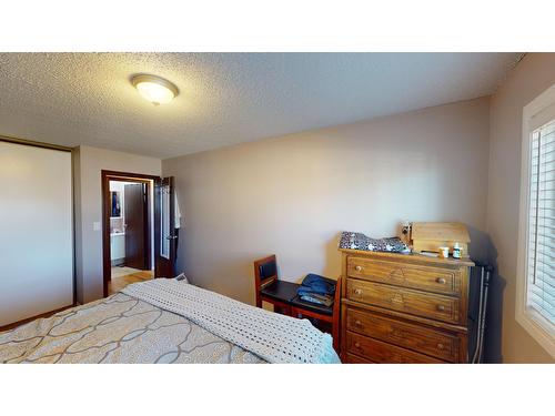 1214 - 2015 2Nd Street N, Cranbrook, BC - Indoor Photo Showing Bedroom