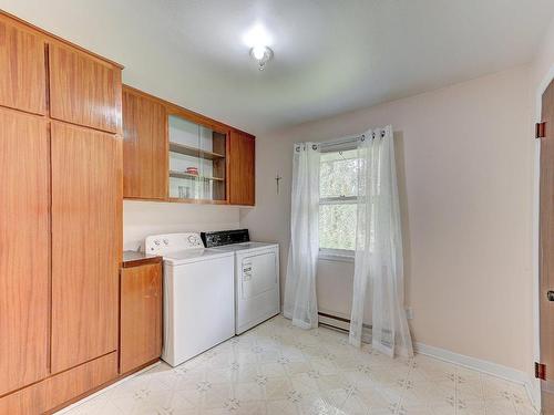 Bedroom - 140 Rue Ste-Catherine, La Prairie, QC - Indoor Photo Showing Laundry Room