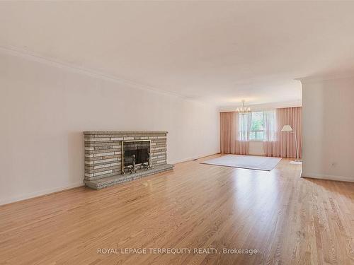 89 Burbank Rd, Toronto, ON - Indoor Photo Showing Living Room With Fireplace