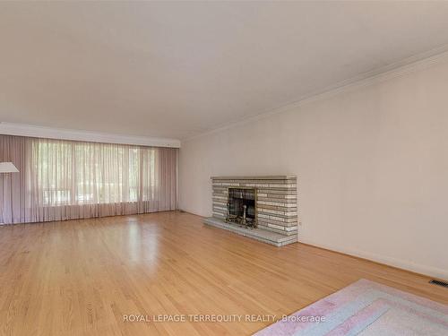 89 Burbank Rd, Toronto, ON - Indoor Photo Showing Living Room With Fireplace