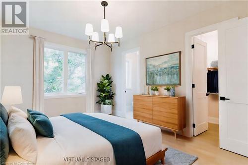 Virtually staged second bedroom - 1 West Avenue, Stoney Creek, ON - Indoor Photo Showing Bedroom