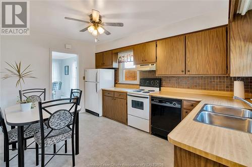 16 Horwath, Kingsville, ON - Indoor Photo Showing Kitchen With Double Sink