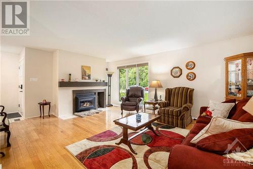 Gas fireplace - 10 Chimo Drive, Kanata, ON - Indoor Photo Showing Living Room With Fireplace