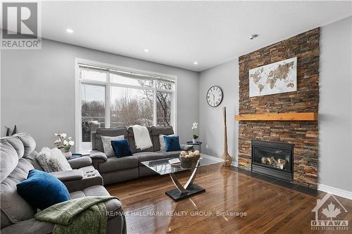 4464 Shoreline Drive, Ottawa, ON - Indoor Photo Showing Living Room With Fireplace