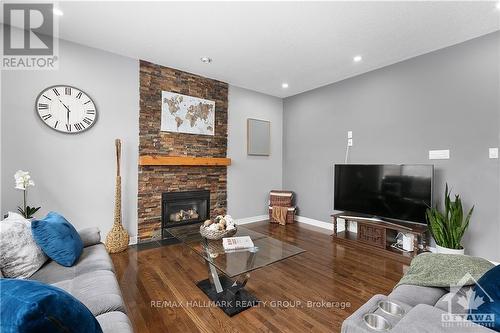 4464 Shoreline Drive, Ottawa, ON - Indoor Photo Showing Living Room With Fireplace