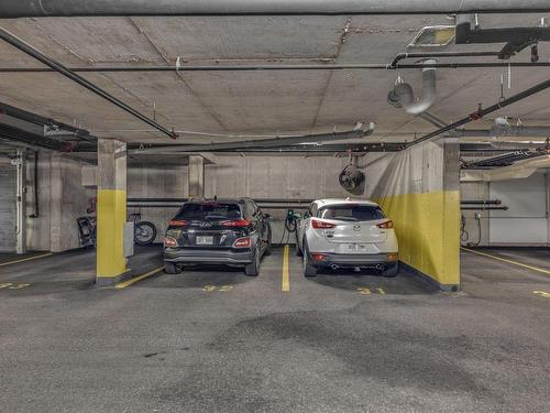 Parking - 208-154 Ch. Du Tour-Du-Lac, Lac-Beauport, QC - Indoor Photo Showing Garage