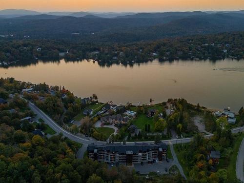 Aerial photo - 208-154 Ch. Du Tour-Du-Lac, Lac-Beauport, QC - Outdoor With Body Of Water With View