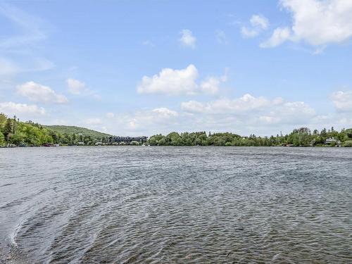 Bord de l'eau - 208-154 Ch. Du Tour-Du-Lac, Lac-Beauport, QC - Outdoor With Body Of Water With View