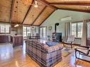 Overall view - 5 Ch. Du Roy, Saint-Étienne-De-Bolton, QC  - Indoor Photo Showing Living Room With Fireplace 