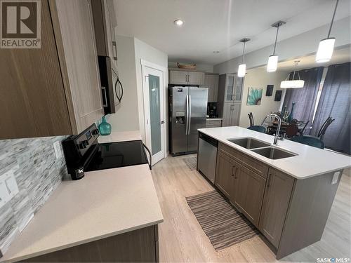 3250 Daphne Street, Regina, SK - Indoor Photo Showing Kitchen With Double Sink