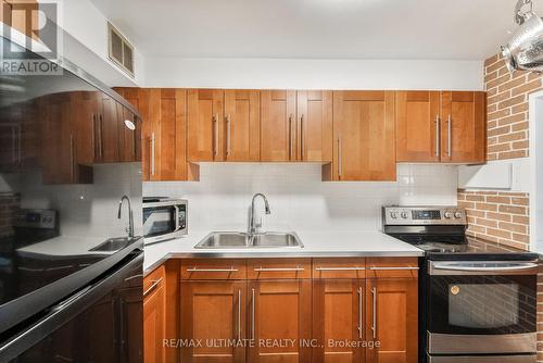 204 - 20 Forest Manor Road, Toronto, ON - Indoor Photo Showing Kitchen With Double Sink