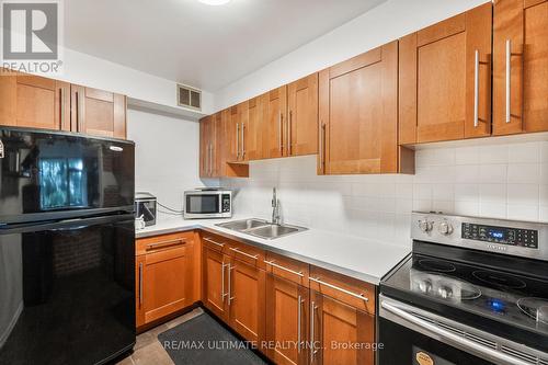 204 - 20 Forest Manor Road, Toronto, ON - Indoor Photo Showing Kitchen With Double Sink