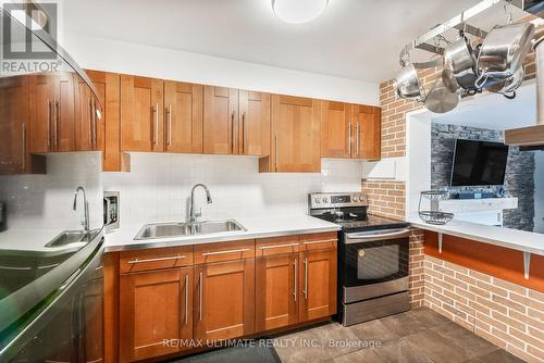 204 - 20 Forest Manor Road, Toronto, ON - Indoor Photo Showing Kitchen With Double Sink