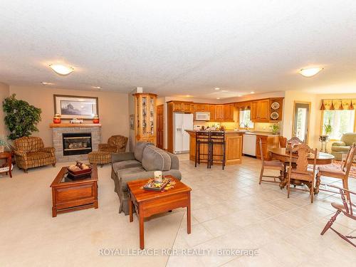 101 Conservation Tr, Centre Wellington, ON - Indoor Photo Showing Living Room With Fireplace