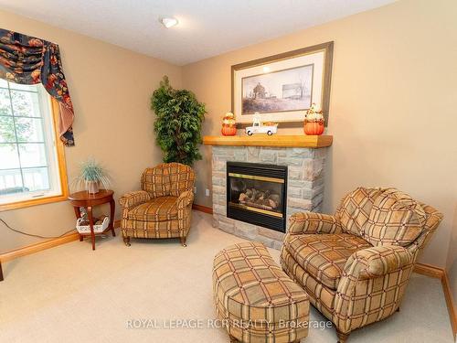 101 Conservation Tr, Centre Wellington, ON - Indoor Photo Showing Living Room With Fireplace