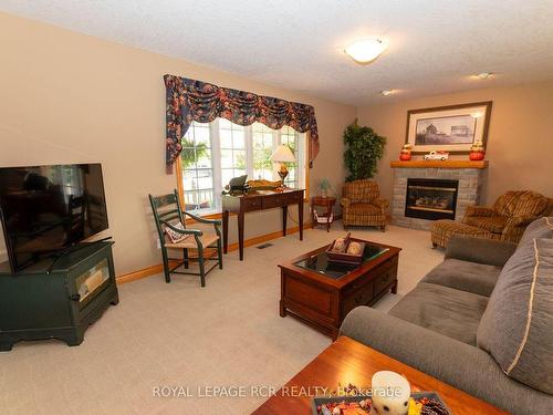 101 Conservation Tr, Centre Wellington, ON - Indoor Photo Showing Living Room With Fireplace