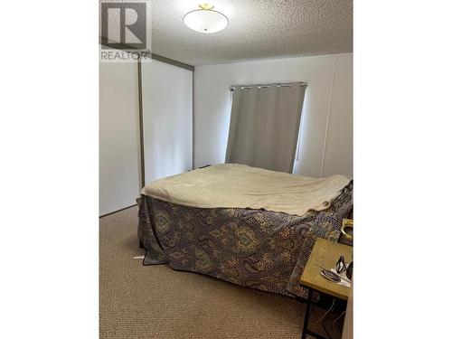 1854 Kokanee  N Crescent, Cranbrook, BC - Indoor Photo Showing Bedroom