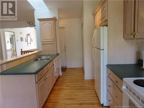 18 Windermere Court, Rothesay, NB - Indoor Photo Showing Kitchen With Double Sink