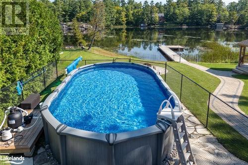 149 John Buchler Road, Port Severn, ON - Outdoor With Above Ground Pool With Backyard