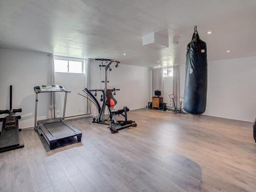 Family room - 100 Rue Jules-Dumouchel, Châteauguay, QC - Indoor Photo Showing Gym Room