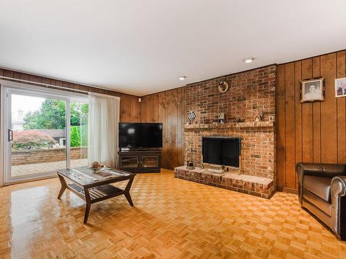 Den - 15 Crois. Fernlea, Mont-Royal, QC - Indoor Photo Showing Living Room With Fireplace