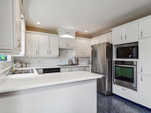 Cuisine - 636 Rue Masson, Repentigny (Repentigny), QC - Indoor Photo Showing Kitchen With Double Sink