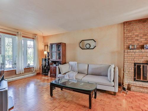 Salon - 8370 Place Fonteneau, Montréal (Mercier/Hochelaga-Maisonneuve), QC - Indoor Photo Showing Living Room With Fireplace