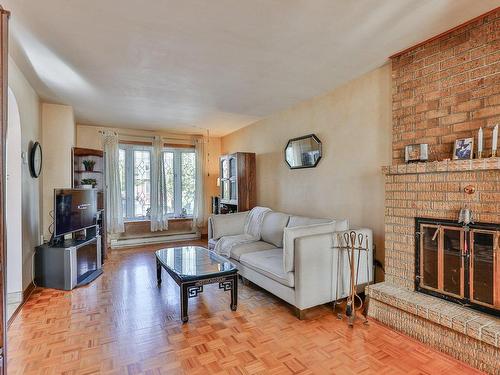 Salon - 8370 Place Fonteneau, Montréal (Mercier/Hochelaga-Maisonneuve), QC - Indoor Photo Showing Living Room With Fireplace