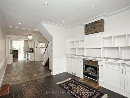 97 Ashburnham Rd, Toronto, ON - Indoor Photo Showing Other Room With Fireplace