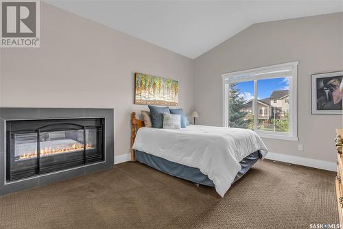 114 Johns Road, Saskatoon, SK - Indoor Photo Showing Bedroom With Fireplace