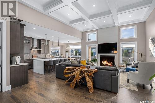 506 Gillies Cove, Saskatoon, SK - Indoor Photo Showing Living Room With Fireplace