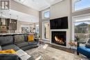 506 Gillies Cove, Saskatoon, SK  - Indoor Photo Showing Living Room With Fireplace 