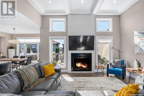 506 Gillies Cove, Saskatoon, SK - Indoor Photo Showing Living Room With Fireplace