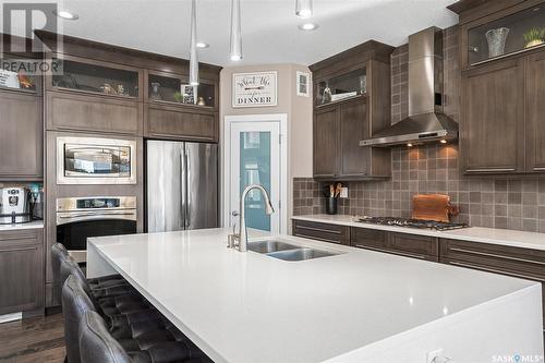 506 Gillies Cove, Saskatoon, SK - Indoor Photo Showing Kitchen With Stainless Steel Kitchen With Double Sink With Upgraded Kitchen