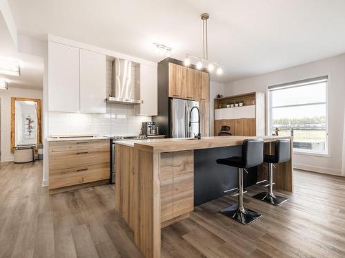 Kitchen - 7-303 Rue De L'Aigle, Carignan, QC - Indoor Photo Showing Kitchen With Upgraded Kitchen