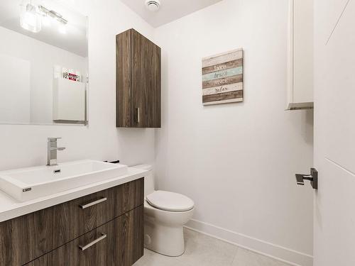 Powder room - 7-303 Rue De L'Aigle, Carignan, QC - Indoor Photo Showing Bathroom