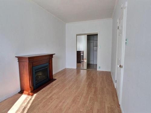 Chambre Ã Â coucher - 212 Rue Monseigneur-Tessier O., Rouyn-Noranda, QC - Indoor Photo Showing Living Room With Fireplace