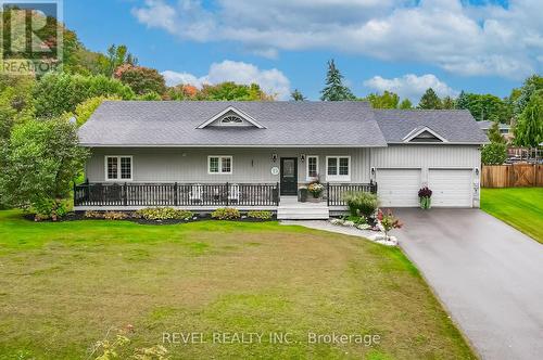 9 Grills Road, Kawartha Lakes, ON - Outdoor With Deck Patio Veranda With Facade