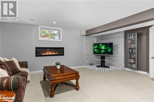 Basement - 3 Cormack Crescent, Bracebridge, ON - Indoor Photo Showing Living Room With Fireplace