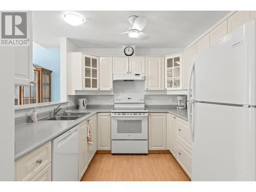 3283 Casorso Road Unit# 303, Kelowna, BC - Indoor Photo Showing Kitchen With Double Sink