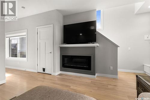 3297 Copeland Road, Regina, SK - Indoor Photo Showing Living Room With Fireplace