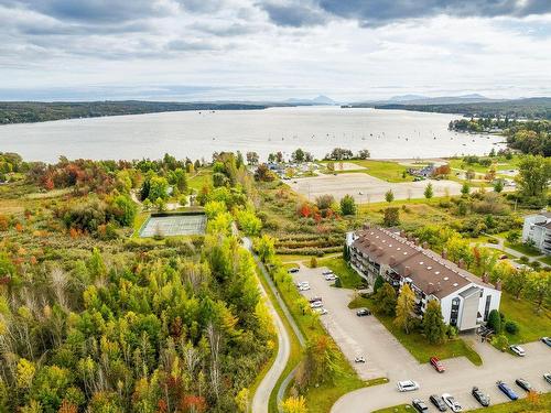 Photo aÃ©rienne - 305-2100 Place Du Club-Memphré, Magog, QC - Outdoor With Body Of Water With View