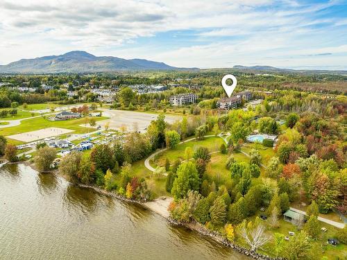 Photo aÃ©rienne - 305-2100 Place Du Club-Memphré, Magog, QC - Outdoor With Body Of Water With View