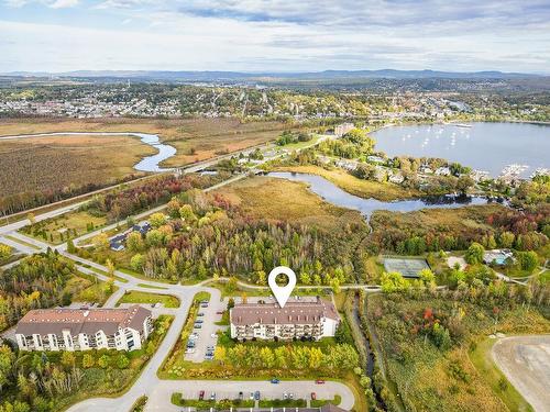 Photo aÃ©rienne - 305-2100 Place Du Club-Memphré, Magog, QC - Outdoor With Body Of Water With View