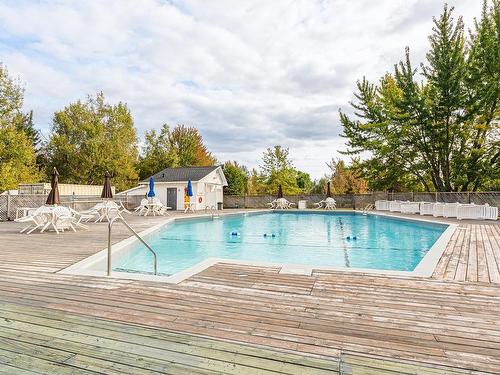 Piscine - 305-2100 Place Du Club-Memphré, Magog, QC - Outdoor With In Ground Pool