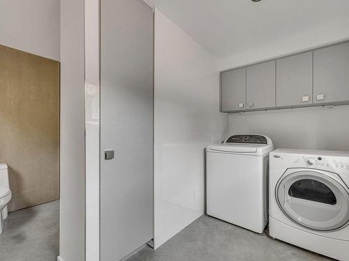 Salle de lavage - 245 Ch. Du Tour-Du-Lac, Lac-Beauport, QC - Indoor Photo Showing Laundry Room