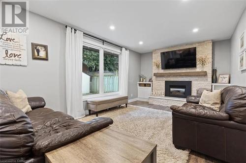 123 Martinglen Crescent, Kitchener, ON - Indoor Photo Showing Living Room With Fireplace